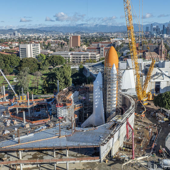 The California Science Center under construction, with a space shuttle visible