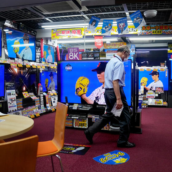 Baseball playing on TVs in an electronics store in Japan