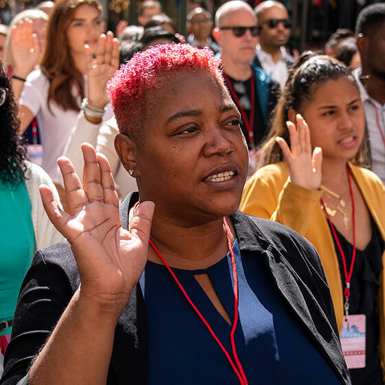 New U.S. citizens recite the the Oath of Allegiance during a naturalization ceremony at Rockefeller Center in New York City in September 2019. Photo: Drew Angerer/Getty Images.