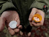 A patient with a bottle of buprenorphine outside a clinic in Olympia, Washington, in November 2019. AP Photo/Ted S. Warren.