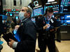 A trader wearing a mask on the floor of the New York Stock Exchange on March 20, 2020. Photo: Spencer Platt/Getty Images.