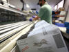 Ballots in a sorting machine at the Santa Clara County registrar of voters office in October 2020. Photo: Justin Sullivan/Getty Images.