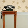 A rotary phone on a table