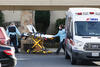 Paramedics outside the Life Care Center in Kirkland, Washington, a nursing home that experienced an early outbreak of COVID-19, on February 29, 2020. 