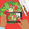 An illustration of a smartphone taking a photo of a salad