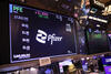 The Pfizer logo and stock price on a display at the New York Stock Exchange