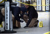 Police at the site of the fatal shooting of United Healthcare CEO Brian Thompson in Manhattan on December 04, 2024.