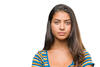 A young woman in front of a white background